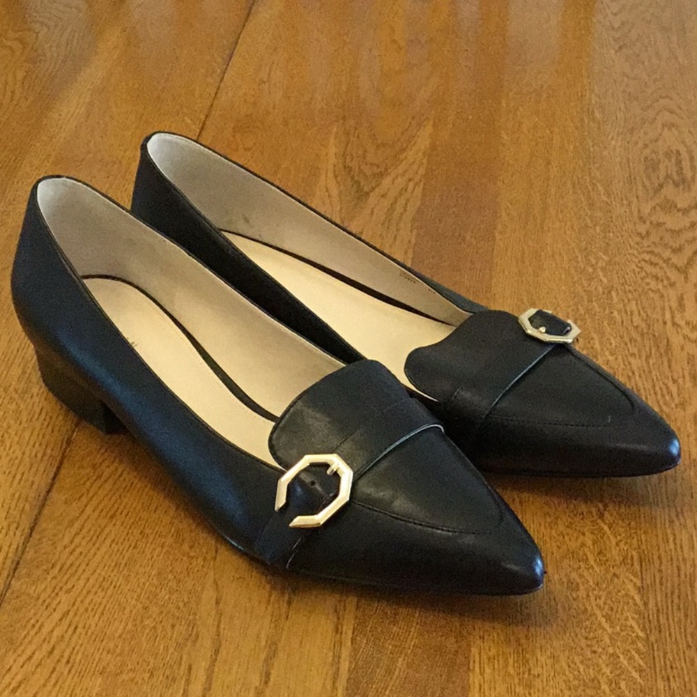 Woman’s Cole Haan black slip on shoe. Size 10. Like new! Gold buckle. 1” heel.